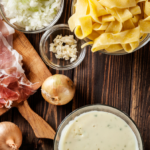 Pappardelle z szynką parmeńską, czosnkiem i orzechami